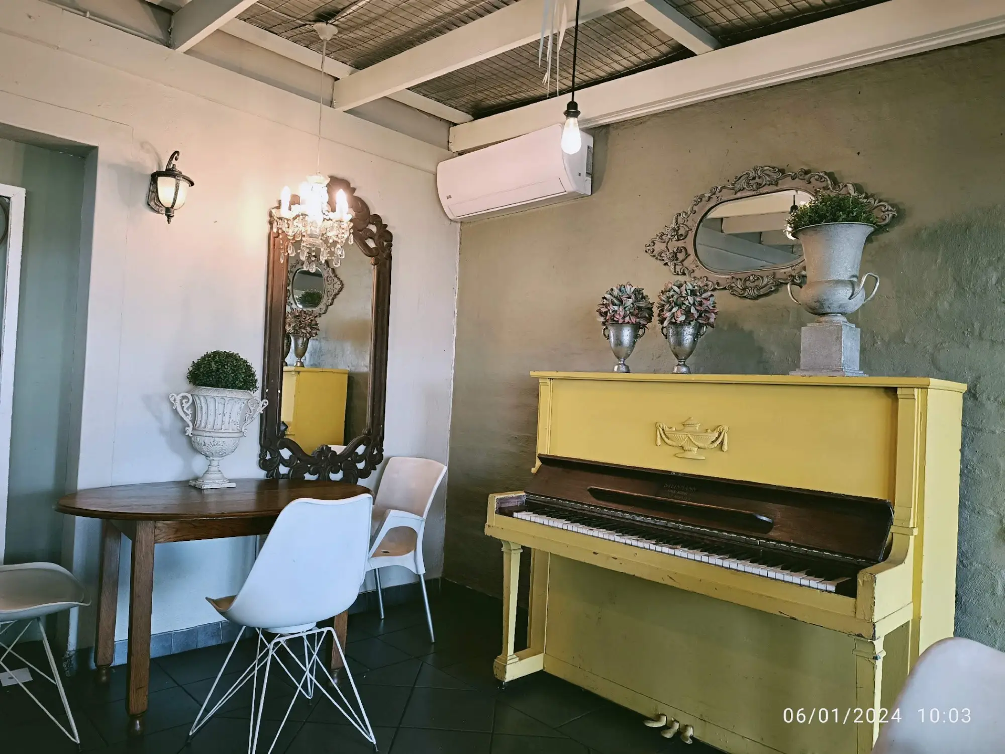 The yellow piano in the garden room